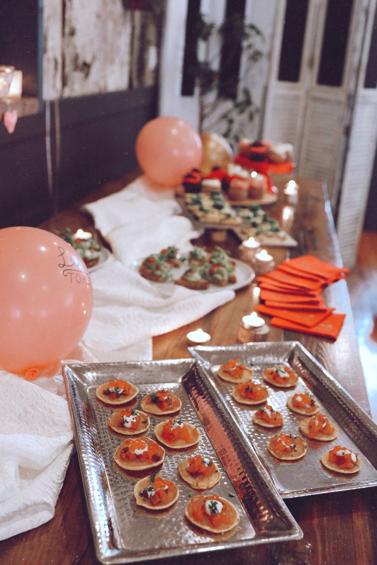 custom designed balloons added a cute touch to the appetizer bar