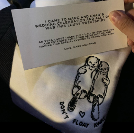 The otter-themed sweater that all Marc and Char’s guests received!