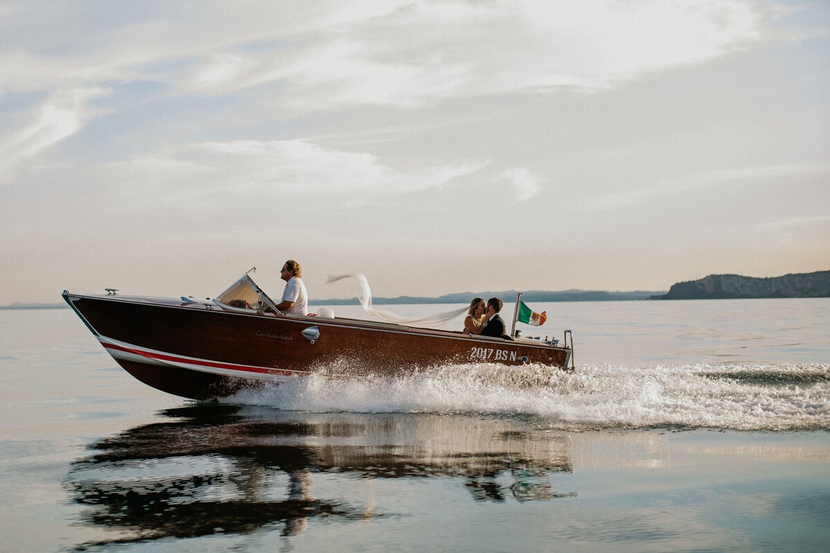 Brie Doffing wedding getaway boat photo
