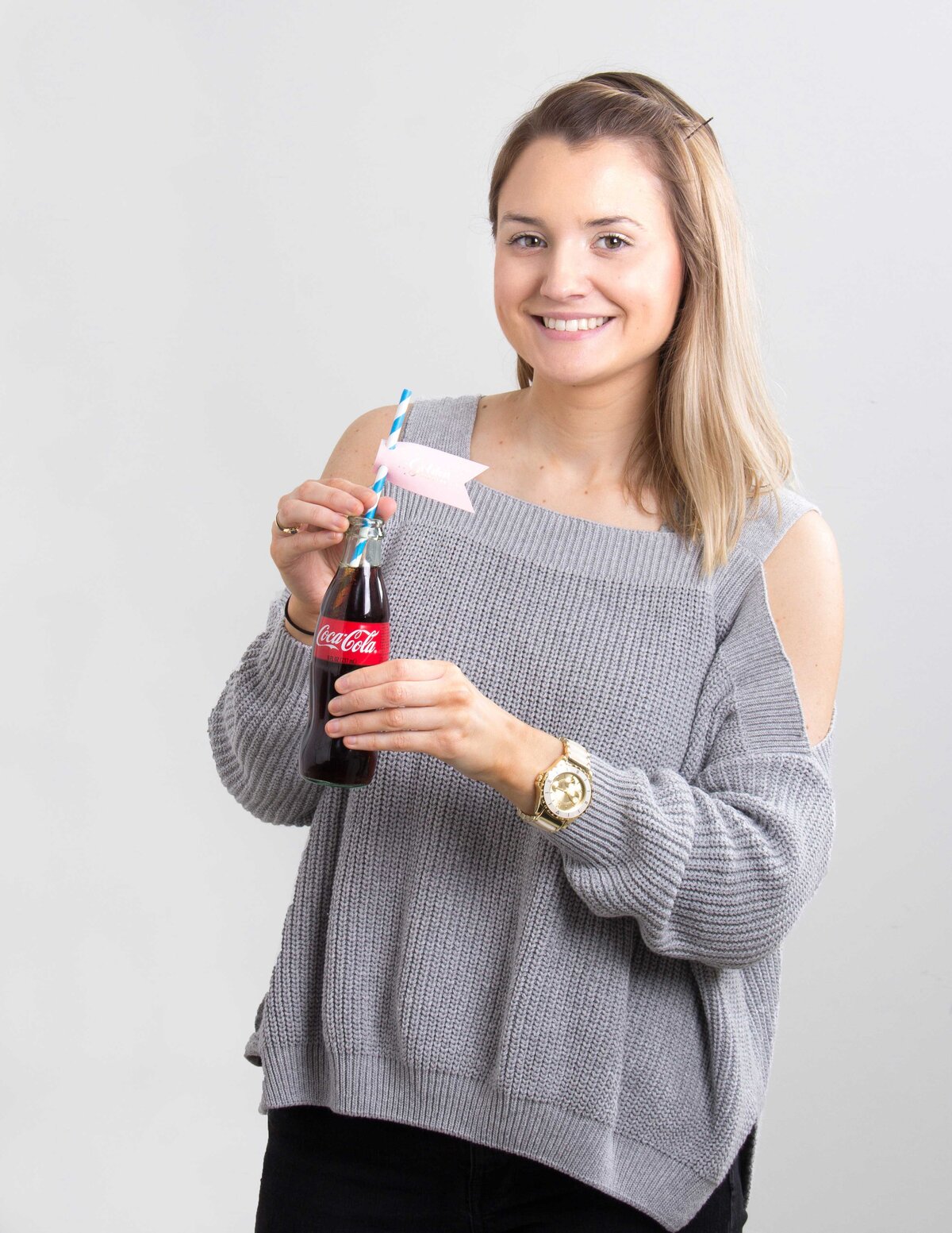 Graphic designer Emily with personalized straw tag