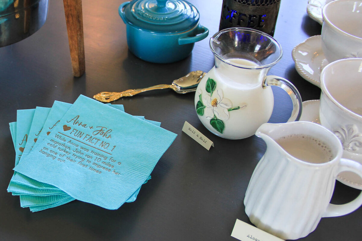 bridal shower coffee bar with personalized fun fact napkins