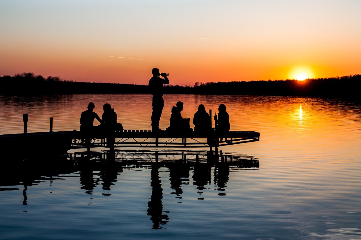 combined bachelor and bachelorette party sunset photo