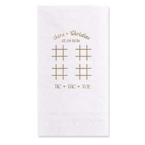 Delight guests with the Nuptial Tic-Tac-Toe Game Napkin, perfect for interactive fun at your celebration. Personalize with your special date and names for a playful twist. A charming addition to any wedding or event table.