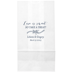 The Love is Sweet Rose Flourish Bag is a delightful token of gratitude for any celebration. Adorned with the heartfelt phrase "Love is Sweet, So take a Treat!" and a graceful rose garland, it's personalized with the couple's names and date, offering a charming way to share joyous treats.