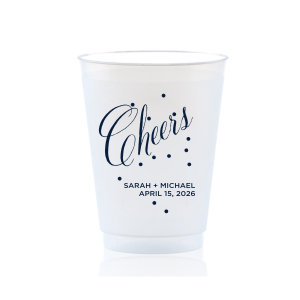 Toast in style with the Cheers Bubble Cup, brimming with effervescence. The word "Cheers" is beautifully rendered in swirling script, surrounded by lively bubble dots, capturing a sense of bubbly joy. Below, the couple's names and event date in block font add a personalized touch to this vibrant celebratory design.