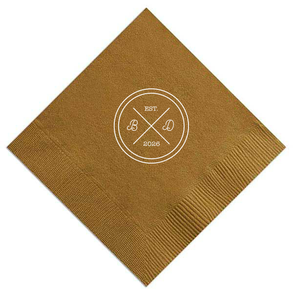 Infuse your reception with the bespoke elegance of the Circle Badge Initials Napkin, reminiscent of an exclusive club crest. 'EST.' and the wedding year anchor the design, with the couple's scripted initials nestled within the distinguished bands, crafting a personal insignia of love.
