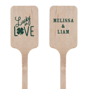 Celebrate your union with the Lucky In Love Stir Stick. On one side, customize this drink stirrer with the couple's names. The other side declares the duo are "lucky in love" adorned with a lucky four leaf clover. Enjoy this stir stick with a signature drink at your wedding. 