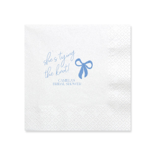 Celebrate the bride-to-be with the Modern Bow Bridal Bliss Napkin, elegantly displaying "She's tying the knot" in a lovely script above her name, all accentuated by a chic bow design. An exquisite choice for adding a personalized touch to any bridal shower.