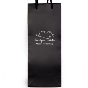 Carry your essentials in the Chillin' Cat Personalized Bag, featuring a relaxed cartoon cat cradling a cup. Add a personal touch with your or your cat's name in a flowing script font below this playful and modern graphic. The perfect tote to pass out wedding party favors or give your friends after a house party.