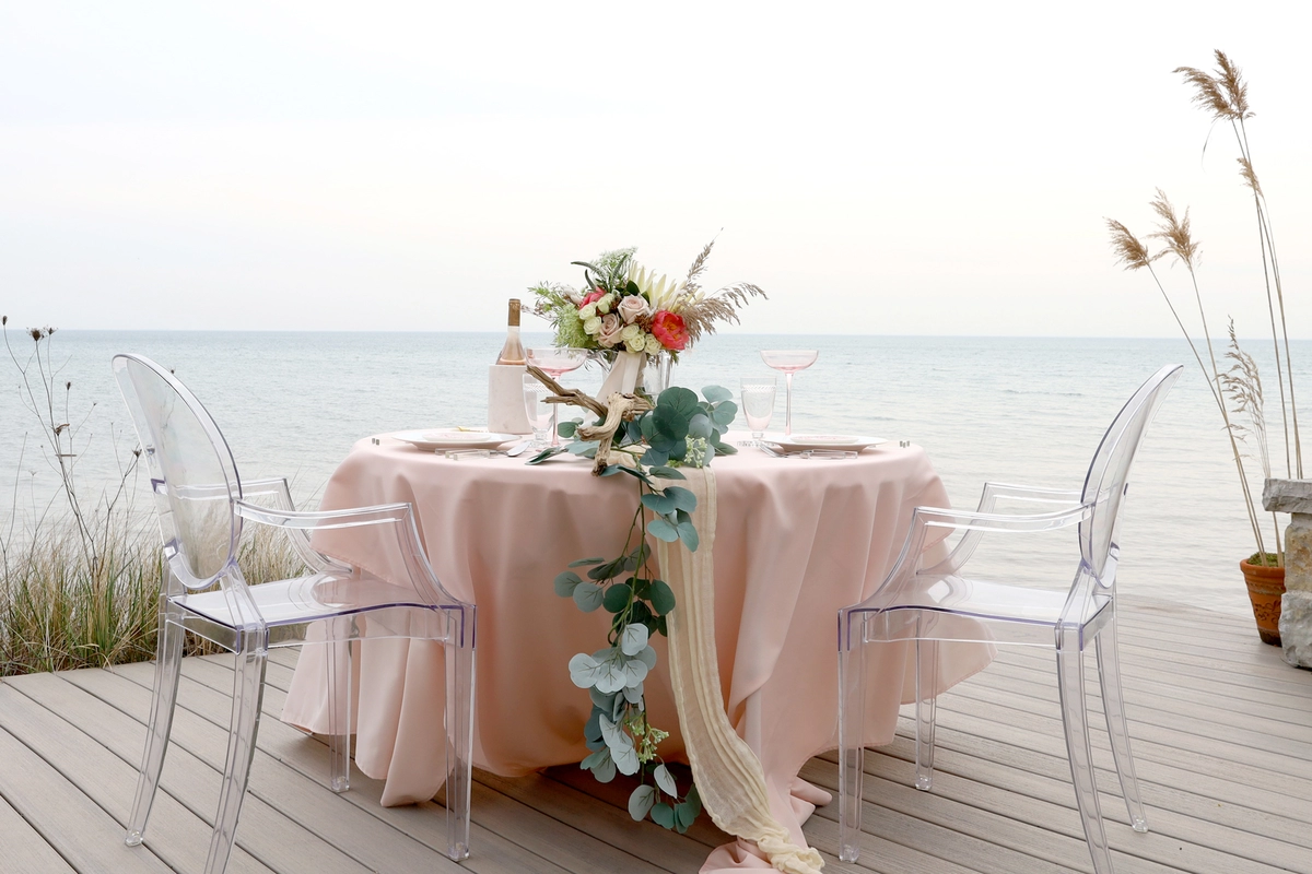gorgeous sweetheart table beside water