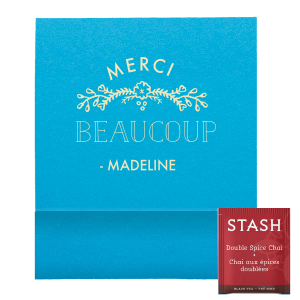 Embrace French elegance with the Merci Beaucoup Favor, perfect for Francophiles. This party favor features “Merci” gracefully arched over an intricate, flourished bough, followed by “BEAUCOUP” and the celebrant’s name. Evoking a Parisian café vibe, it’s a sophisticated way to say “Thank you very much” while offering a delightful tea experience as a bon voyage gift.