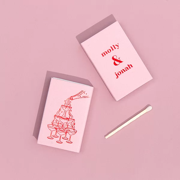Personalized matchboxes with a Champagne tower