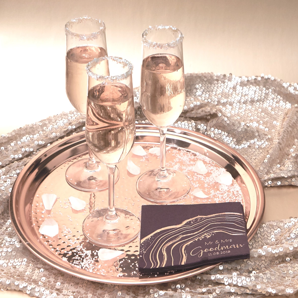 rose champagne with sugar rimmed glasses for toasts