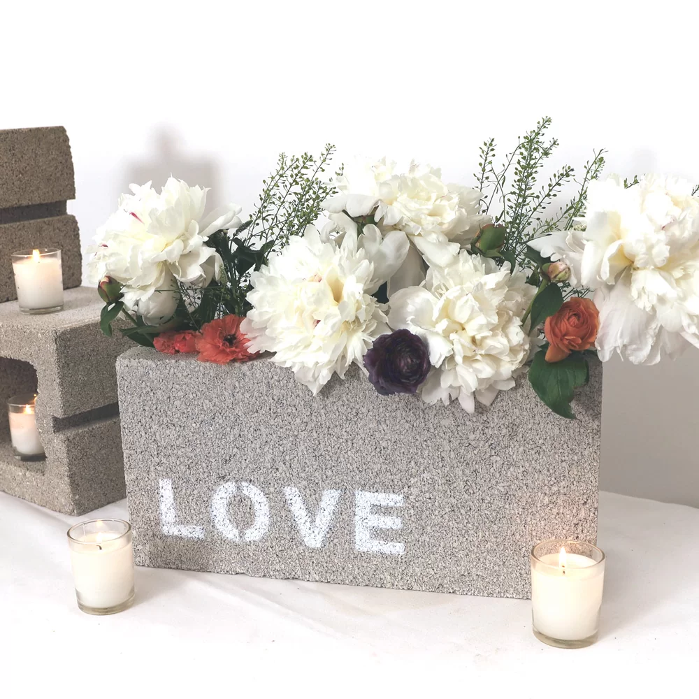 simple flower bouquets tucked in urban wedding décor