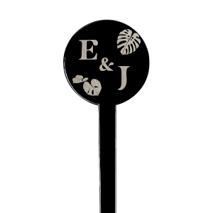 The Tropical True Love Initials Stir Stick brings the lush vibrancy of the tropics to your celebration, featuring your initials encircled by an array of exotic leaf graphics. The initials themselves are inscribed in a relaxed and breezy script that captures the laid-back essence of a sun-kissed getaway. This personalized stirrer is a fresh addition to any event, inviting guests to sip and savor the spirit of paradise.