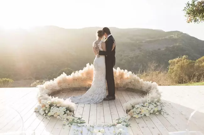 pampas grass halo at incredible mountain view wedding ceremony