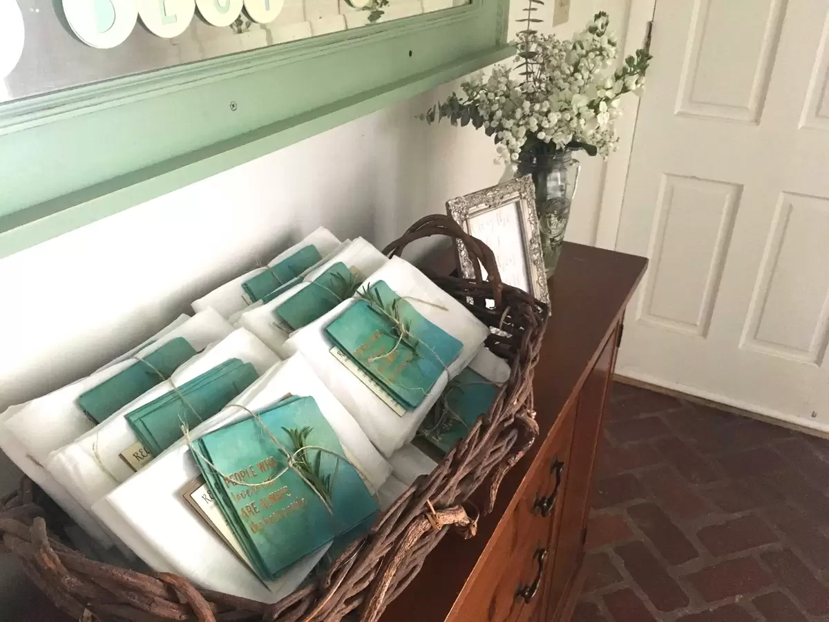 custom watercolor cocktail napkin and recipe cards for personalized party favors at a kitchen bridal shower