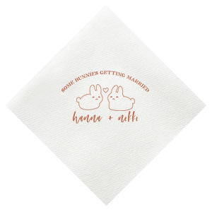 Hop into matrimonial joy with the Some Bunnies Wedding Napkin, complete with an adorable drawing of two bunnies and a heart nestled between them. The playful phrase "Some Bunnies Getting Married" sets a whimsical tone, while the area below awaits the couple's names, scripted with modern elegance. A delightful addition to your wedding tablescapes.