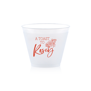 Raise a glass to beauty and sentiment with the Floral Toast Cup. Featuring "A TOAST TO" in bold block letters, framed by an intricate peony design symbolizing love and joy. Personalize it with the celebrant's name in beautiful script, making every sip a celebration of their special day.