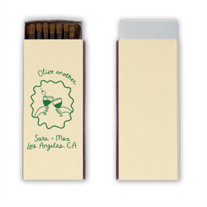 Keep the good times coming with the Olive Another Cheers Matchbox. Featuring a hand-drawn pair of glasses cheersing within a ribbon frame, the design is fully customizable in your choice of text and foil stamp colors to best match your party's aesthetic.