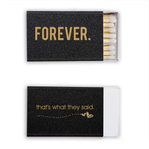 The That's What They Said Wedding Match is an engaging blend of contemporary vernacular and artistry. One panel displays the modern phrase “That’s what they said,” while another whimsically illustrates hearts soaring, leaving a trail of dots. The third side, with a bold "FOREVER," encapsulates eternal romance. This is a design that communicates boldly and artistically. 