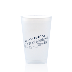 Embark on a journey of celebration with the Our Greatest Adventure Couples Cup. This imaginative design features a paper airplane soaring from "our" into a swirling adventure around "greatest adventure," accented by the couple's initials. Perfect for adding a splash of excitement and movement to your party!