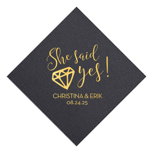 Celebrate the joy of a new engagement with our She Said Yes Diamond Napkin. Its vibrant text and sparkling diamond image exude excitement and happiness. Personalize with the couple’s names and the special date, making it perfect for engagement parties, toasting to the future, and marking the beginning of a beautiful journey together.
