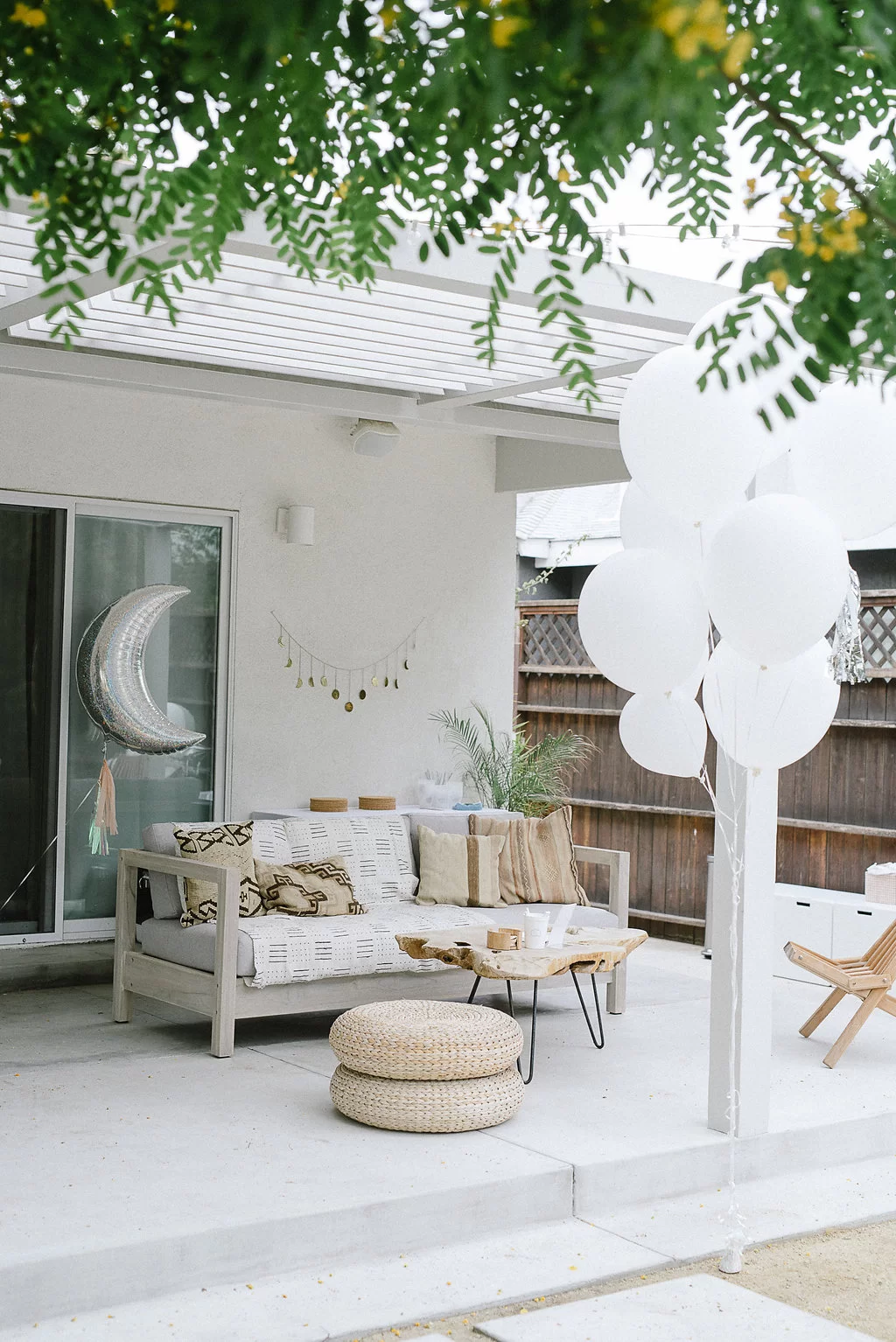 comfy seating area at sky themed birthday party by Molly from Almost Makes Perfect