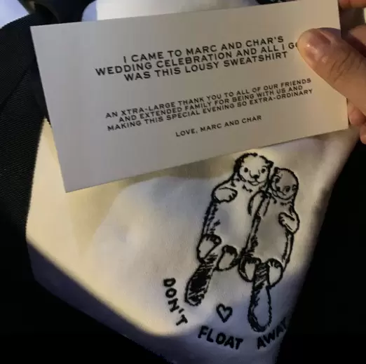 The otter-themed sweater that all Marc and Char’s guests received! 