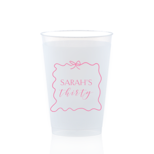 Sip in style at your birthday bash with the Ribbon Frame Birthday Bash Cup, elegantly framed like a ribbon and bow, featuring your name and new age in a whimsical script. A festive and personalized touch to celebrate another fabulous year.
