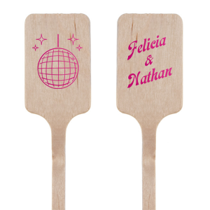 The Disco Duo Stir Stick brings a splash of retro fun to your celebration with a dazzling disco ball graphic on one side, perfect for setting the mood for a night of dancing and joy. On the other side, your names are inscribed in a font that boasts classic lines with a touch of modern sophistication, capturing the elegance of bygone eras while remaining contemporary. This personalized stir stick is ideal for adding a touch of nostalgia and personal flair to your party atmosphere.