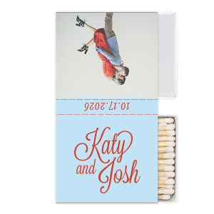 Capture love’s spark with the Love Snapshot Photo Matchbox. It features the couple’s names in a fun, flirty script on the front. The back displays a playful photo of the couple, radiating their shared joy. The celebration date adorns the side, making this matchbox a memorable keepsake of their special day. This design invites couples to choose a beloved photo to personalize their own matchbox, adding a unique and intimate touch to their wedding celebration.