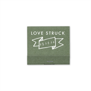 Ignite romance with the Love Struck Banner Matchbox featuring the smitten phrase above a banner cradling your special date. This design charmingly captures the couple's love, making each strike a celebration of their union.
