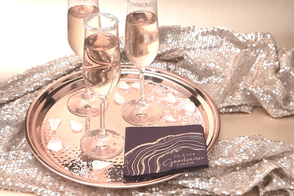 rose champagne with sugar rimmed glasses for toasts