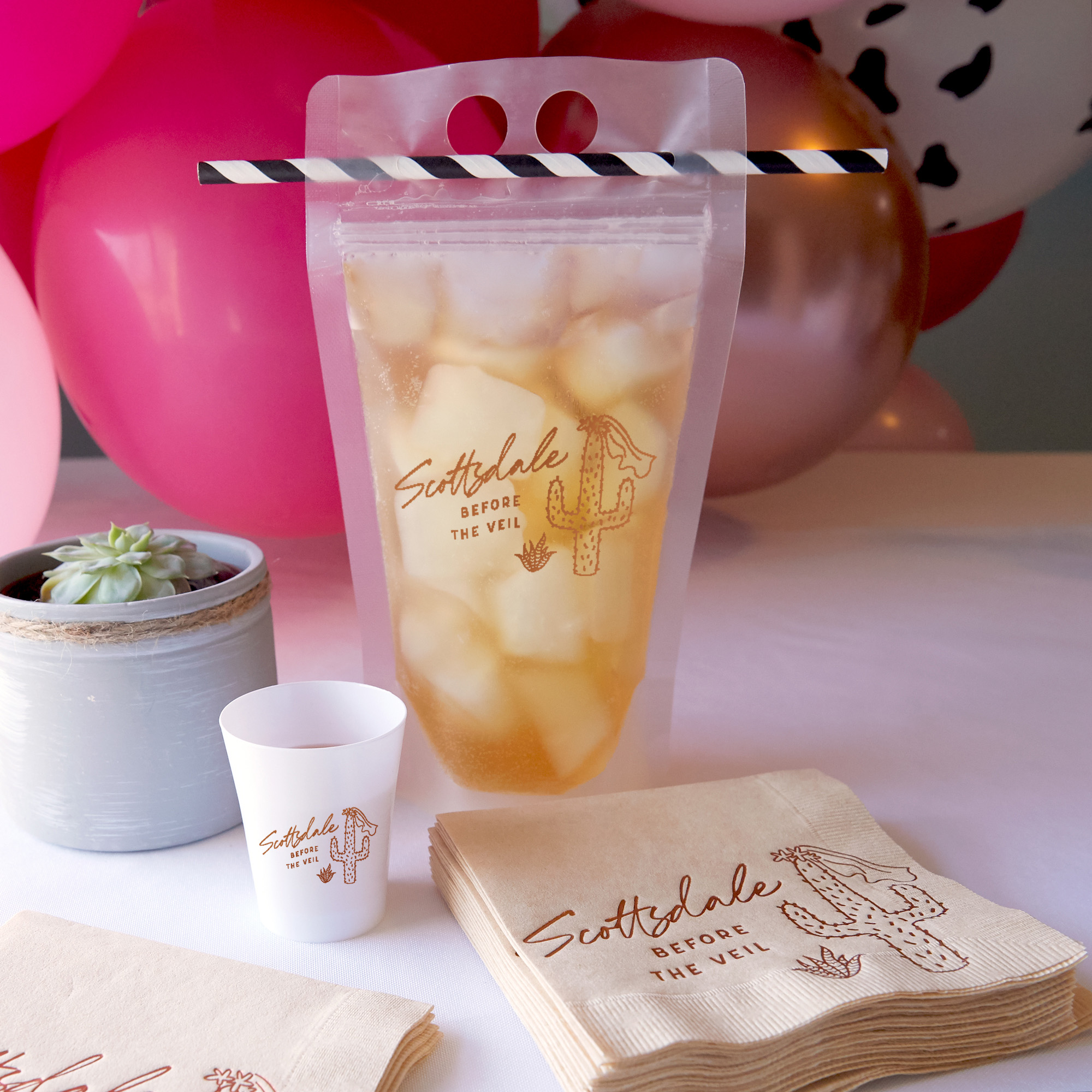 Party scene with drink pouch and shot glasses