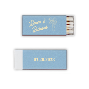 Celebrate your union with the Nuptial Grace Bow Matchbook, personalized with the couple's name in a modern script. The beautifully flowing bow graphic adds an element of elegance and movement, perfect for your sophisticated wedding day.