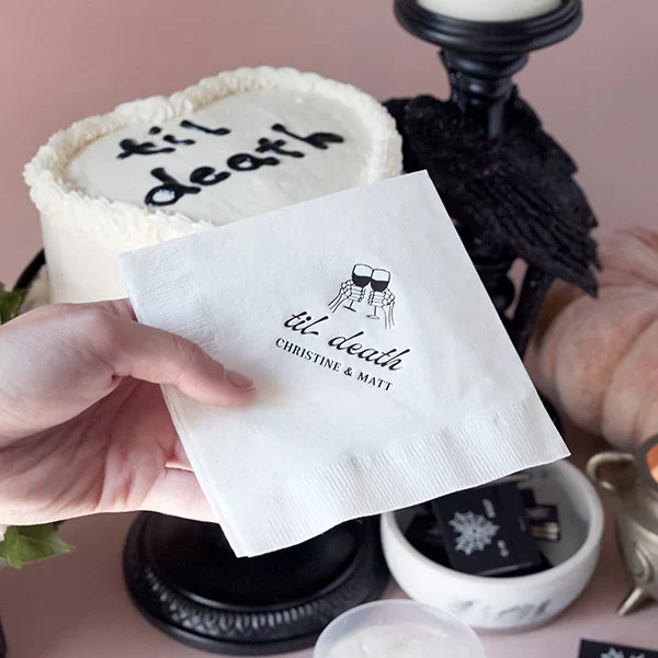 Til Death Napkin held in hand