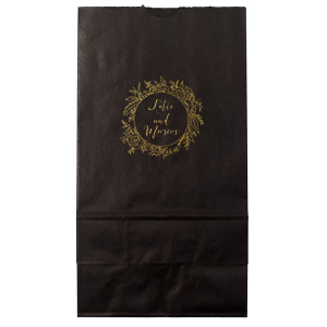 The Regal Wreath Bag design presents an elegant and abundant floral wreath, symbolizing luxury and nature's richness. Enclosed within this lush botanical embrace, the couple's names are elegantly scripted, adding a touch of royal sophistication. This design artfully marries opulence with the charm of natural abundance.