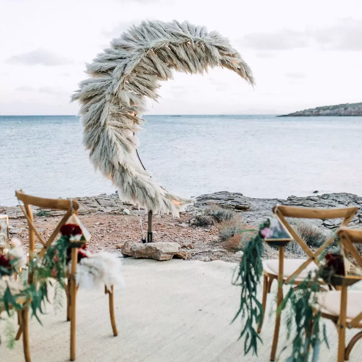 pampas grass focal point at gorgeous waterside wedding