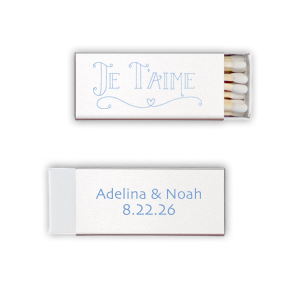 Kindle romance with the Je T'aime Match, whispering 'I love you' in French, adorned with a heartfelt flourish. This matchbox, bearing the couple's names and date, is a tender nod to love with a Parisian touch.