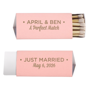 The Modern Perfect Match matchbox stylishly displays the couple’s names in bold block letters, framed by dots. Below, “A Perfect Match” in traditional script adds whimsy. The reverse side proclaims “JUST MARRIED,” with the wedding date, melding modern design with romantic charm.