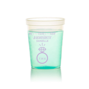 Raise a cup to the guest of honor with the Bachelorette Engagement Cup, where love and diamonds meet in celebration. Above the glinting solitaire, 'We Love Our Bachelorette' sets off the cheers, with her name leading to the ring that playfully hugs the date.