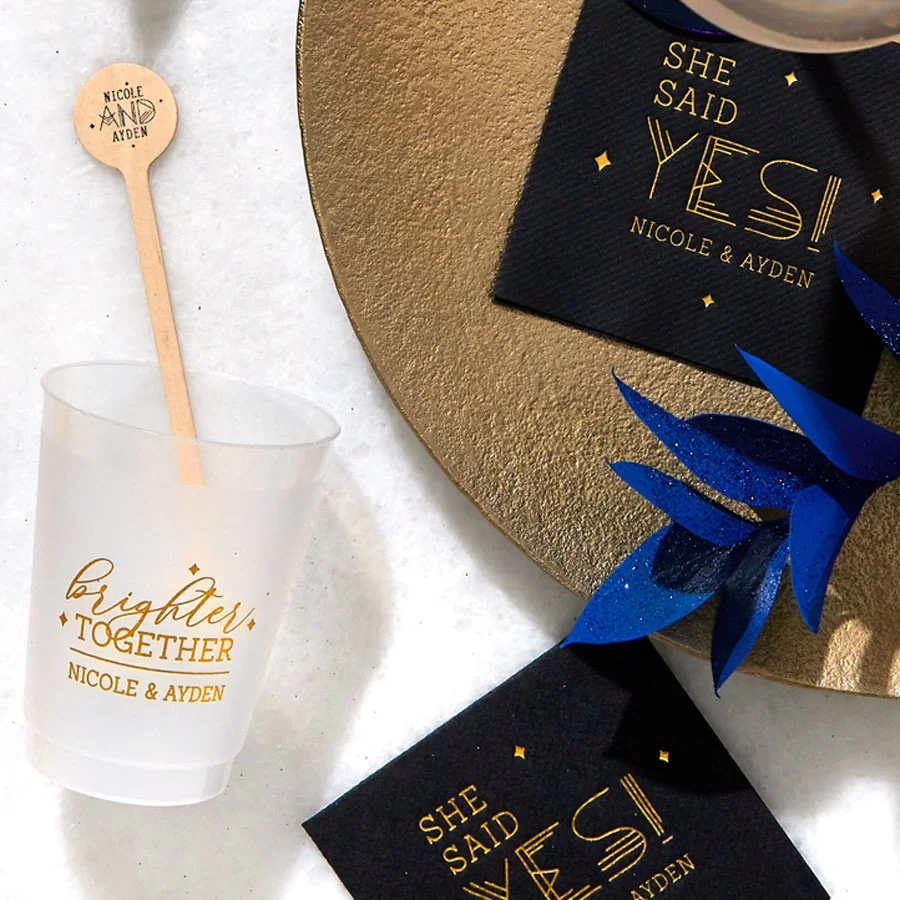 custom designed cosmic inspired petite cocktail napkins, cups and swizzle sticks