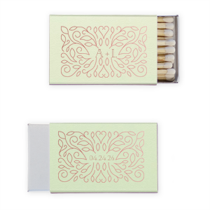 Spark elegance with the Floral Spread Matchbox, where hand-drawn blooms twine around the couple's initials. The flip side dates the event, all blossoming into a botanical tribute to the couple's blooming future.