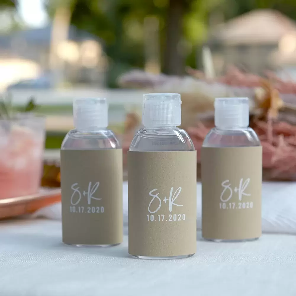 Custom hand sanitizer bottles is a great wedding favor in 2021