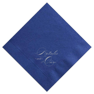 The Sophisticated Script Couple Napkin design showcases the couple's full names in an elegant script, each starting with dramatically flourished initials that artistically intertwine. This design embodies elegance and excitement, creating a visually striking statement of flair and sophistication for any celebratory event.