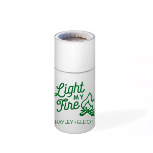 Set the scene with the Light My Fire Matchbook, echoing the classic tune in a design ideal for engagement parties, weddings, or home decor. It displays “Light My Fire” in a playful font, accompanied by a quaint campfire graphic. Below, the couple’s names in bold all-caps add a personal touch, evoking the warmth and romance of a cozy campfire setting."