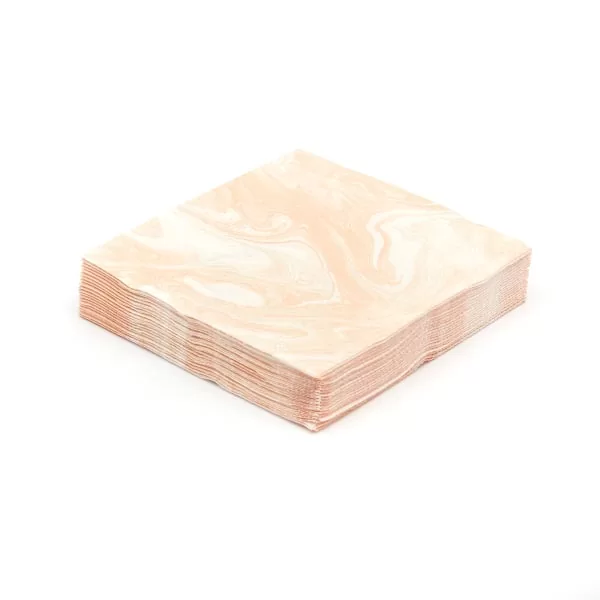 stack of marble blush napkins for party