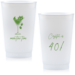 Toast to another fabulous year with the Meowtini Time Birthday Cup, showcasing a whimsical drawing of a cat cozily perched in a martini glass, olives playfully cascading over the rim. Personalize with your name and milestone age to the right of the glass in an elegant script font, inviting a celebratory sip with feline flair.