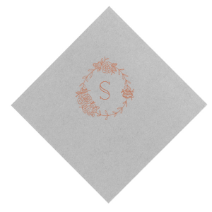 The Peony Frame Monogram Initial Napkin embodies Victorian elegance with its detailed floral arrangement of peonies, symbolizing happiness and prosperity. With the celebrant's initial in the center, this napkin conveys an air of sophistication and natural beauty.